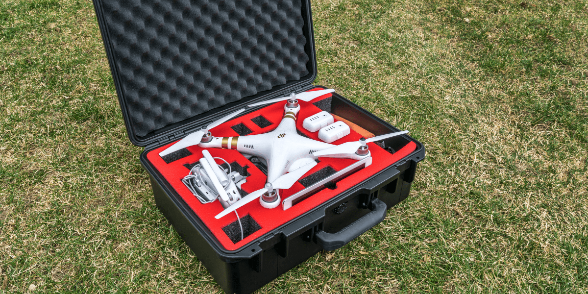 A commercial drone packed in a travel case.